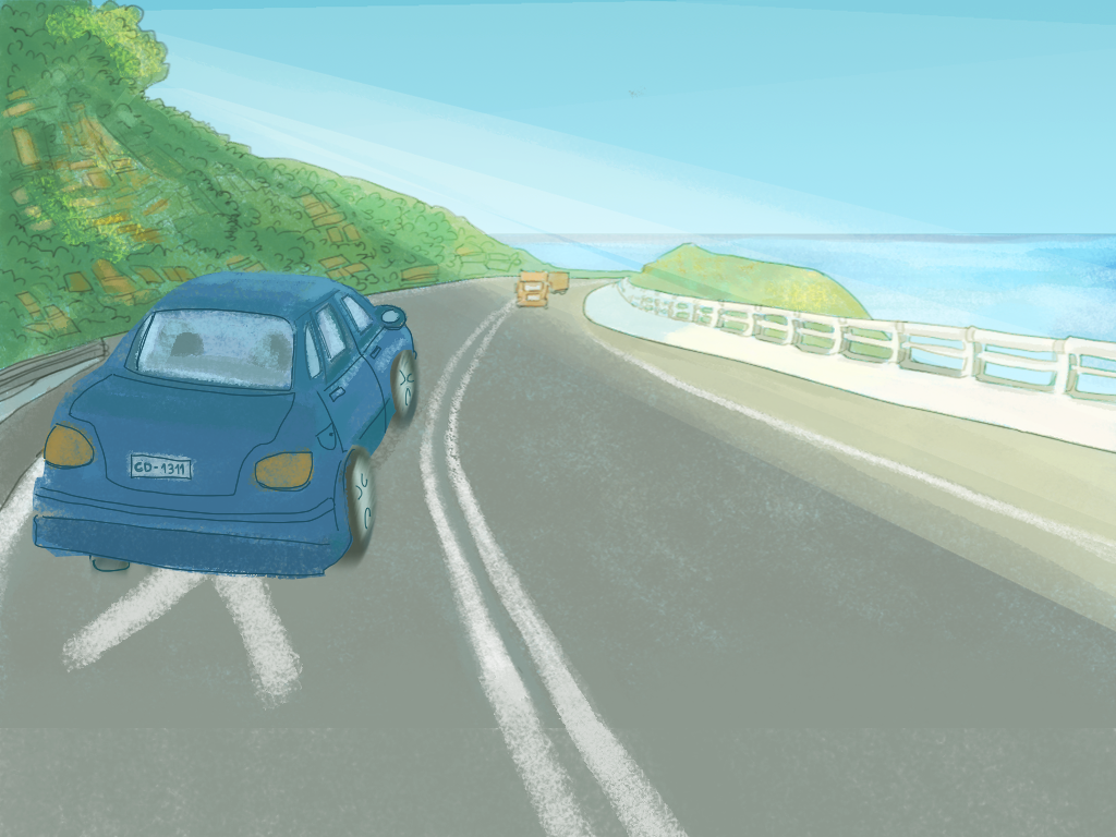 Un auto va por la carretera en dirección a la playa